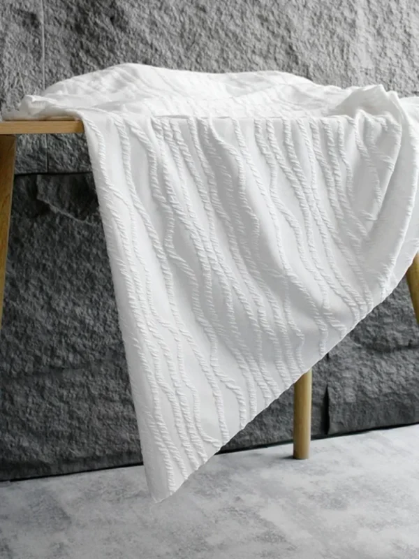 S3a50444f963a4082a90479c8eba5bec5o.webp White Striped Jacquard Knit Fabric – 1 m