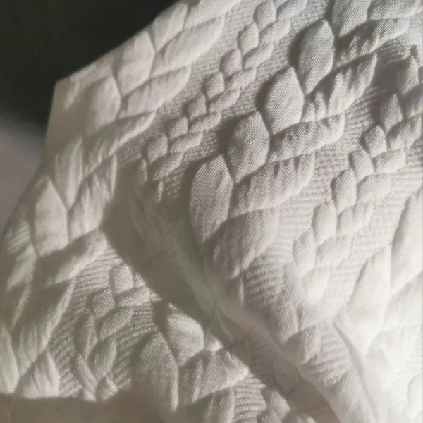 S55c9ca4055574cca88593dabdfa1b23dZ.webp Twisted Texture Knit Fabric – 1 m