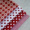 cn-11134207-820l4-mf5hw3wl1lhl58.webp Cotton Twill Fabric – Red Polka Dot Checkered Design